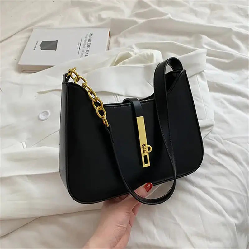 Classy black and gold shoulder bag